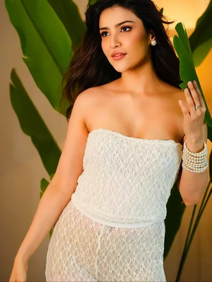 Another shot of Firoza Khan, where her soft makeup and wavy hair create a fresh and effortless vibe.