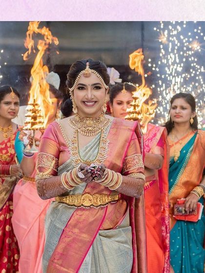 A classic bridal entry is always timeless. Here, the bride enters under a canopy of fire, a traditional and powerful South Indian wedding moment that we were honored to bring to life.
