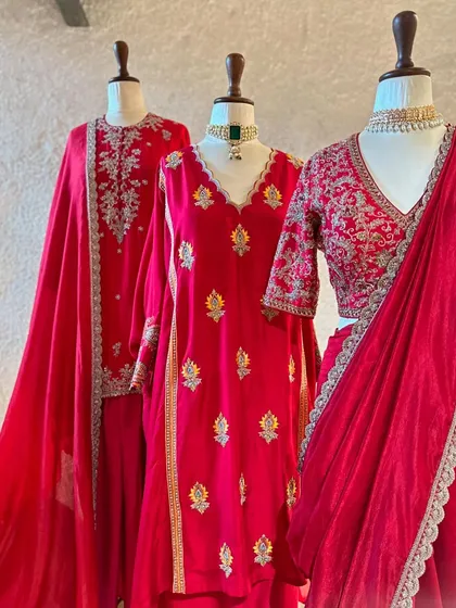 Red is the color of celebration. This collection shows different ways to wear it, from a simple embroidered kurta to a classic saree with a heavily worked blouse.