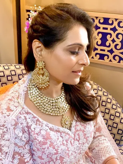 A close-up of the soft glam makeup, showing the gentle contouring and soft brown smokey eye.