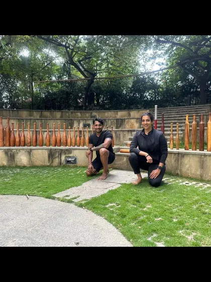 My partner and I with our full collection of Indian clubs and Gadas, ready for a workshop. We provide equipment for everyone to try.