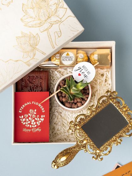 Another view of the naming ceremony hamper, showing the elegant arrangement of the curated items inside the personalized box.