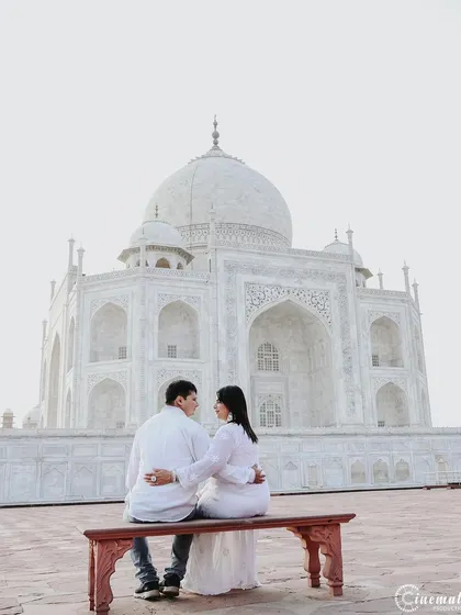 There is nothing more iconic than a pre-wedding shoot at the Taj Mahal. I focus on finding unique perspectives that frame this monument to love as a quiet backdrop to your own story, creating a timeless and elegant couple portrait.