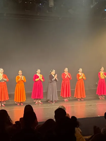 Taking a final bow with my fellow dancers after a show. The camaraderie and shared passion on stage are an essential part of every large production I'm involved in.