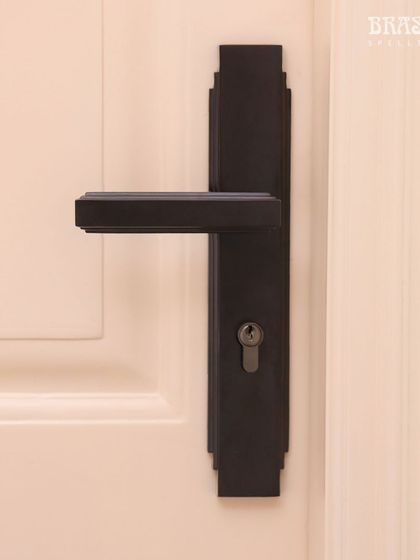 A detailed shot of the Natali Lever Handle, highlighting its sharp, geometric profile and the smooth, matte finish. This is a handle for those who appreciate precision and understated luxury.