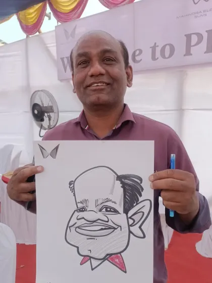 Another angle of the guest, showing his happiness with the drawing.