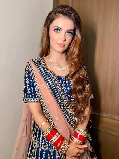 A portrait of my beautiful Sikh bride ready for her reception. The bold blue eye makeup is the centerpiece of this glamorous look.
