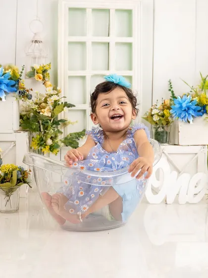 Splash time after the cake. A post-cake-smash bubble bath is a fun way to end the session and get some incredibly joyful photos.