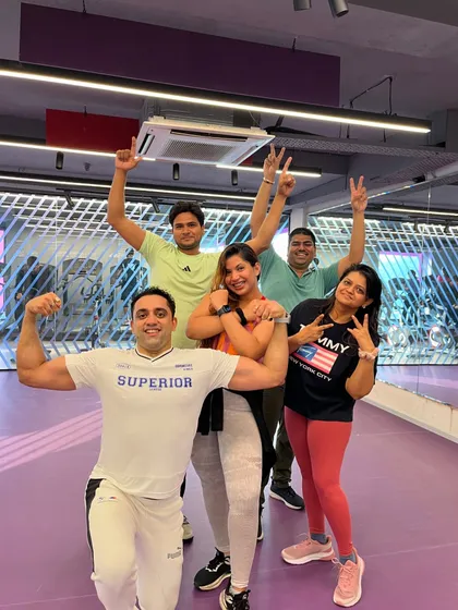 All smiles and flexes after a tough workout. This is my fit-fam, and I'm so proud of their hard work.