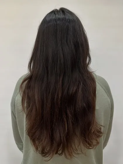 This is my 'Chocolate Pecan Dream' creation. We started with a faded base and gave her this incredibly rich, warm brown with delicate pecan highlights. The result is a glossy, healthy-looking color that’s perfect for any season.