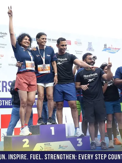 Celebrating a podium finish. It's an amazing feeling to see my athletes' hard work pay off with a top spot.
