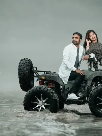 A stylish shot of a couple posing with an ATV in the misty river. This is a great option for a unique and adventurous pre-wedding theme.