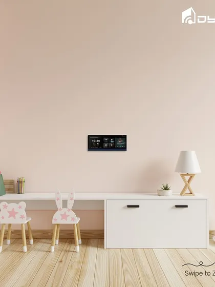 Here is the HomePad installed in a child's study area. Its sleek design fits well with the clean, modern furniture, providing smart control without being obtrusive.