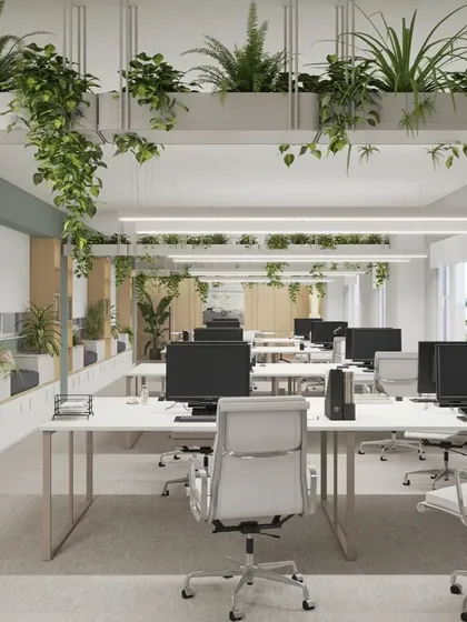 This biophilic office design integrates nature directly into the workspace to boost employee wellness and productivity. We used overhead planters and clean, white workstations to create a bright, airy, and refreshing open-plan environment that feels connected to the outdoors.