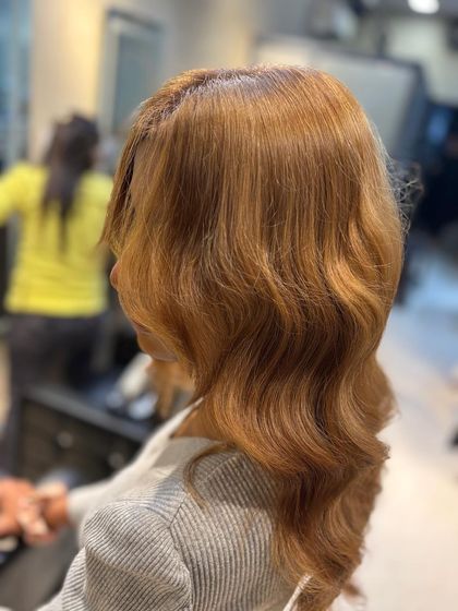 A side view of the ash blonde hair, demonstrating how the color looks in different lighting.
