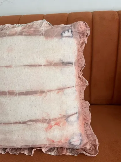Another detailed shot of the ruffled pillow cover. You can see the subtle color variations and textures that make naturally dyed textiles so special.