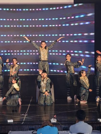 Our students performing to "Jhoome Jo Pathaan," a high-energy Bollywood number with powerful moves and synchronized formations.