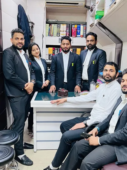 When you hire me, you get the strength of my entire team. This is 'Team F 225', a group of dedicated legal professionals who collaborate on every case, from drafting documents to court appearances.