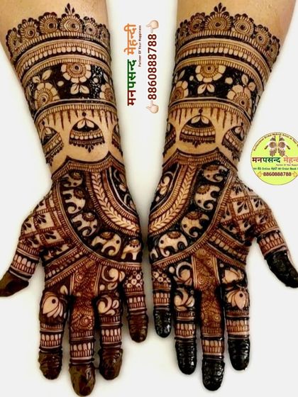 This design features classic temple dome (gumbad) and elephant motifs. The semi-circular patterns on the palm create a beautiful focal point.