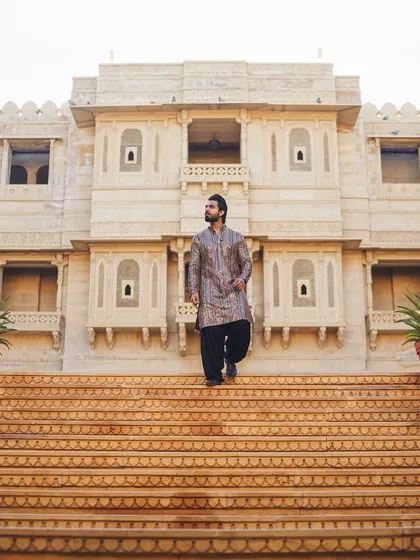 Descending the grand staircase of a palace. Every entrance should feel epic.