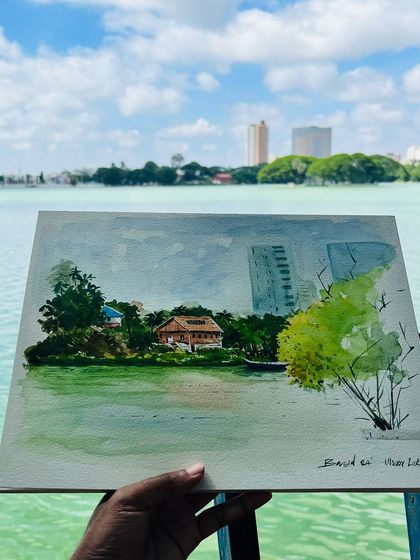 A watercolor painting I did on location at Ulsoor Lake in Bengaluru. I loved the contrast between the serene traditional house on the island and the modern city skyline in the background.
