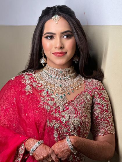 A beautiful portrait of the bride, her makeup looking fresh and radiant for her reception or sangeet.