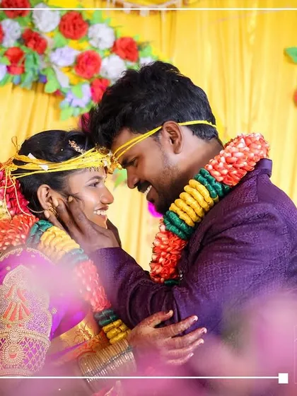 An intimate moment between the bride and groom during their wedding reception. I used a soft focus on the foreground to draw the eye directly to their happy expressions and the connection they share.