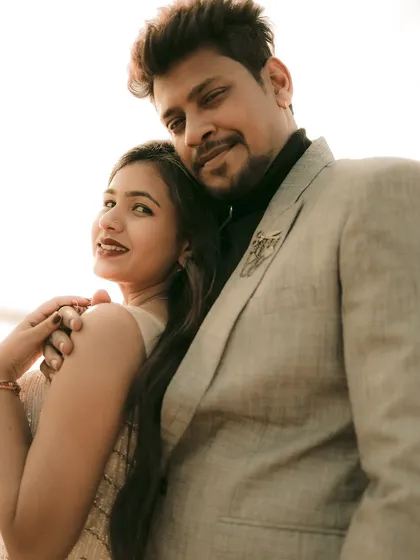 A stylish portrait from a pre-wedding shoot, showing the couple's personality and connection.