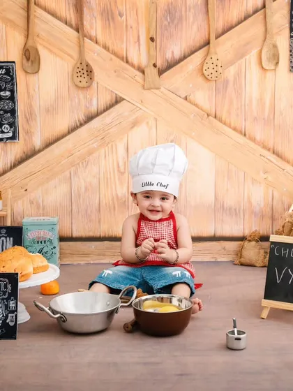 Chef Vyom is ready to cook up a storm. This themed shoot is perfect for capturing the playful and curious nature of toddlers.