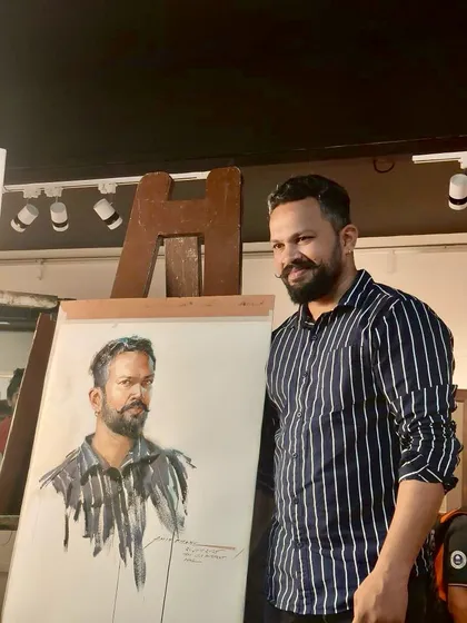 Standing next to the finished watercolour self-portrait. It's always an interesting challenge to paint oneself.