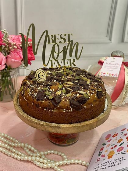 A special cake for the best mom ever. This wholesome tea cake, topped with seeds and chocolate chunks, was the centerpiece of our Mother's Day menu, designed to celebrate with love.