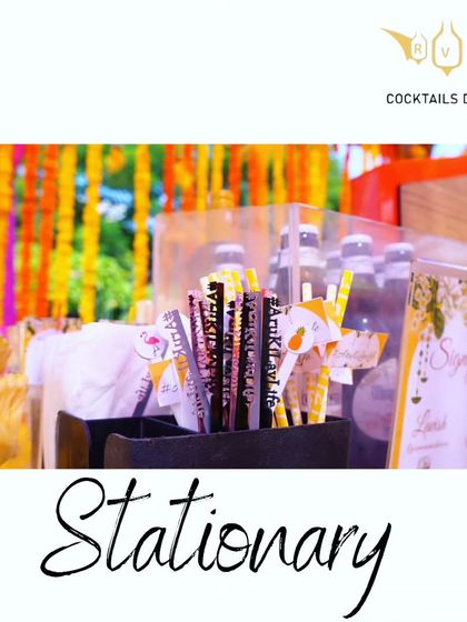 Another look at our customized bar stationery. These stirrers, featuring different designs and the event hashtag, add a cohesive and personal element to every drink served.