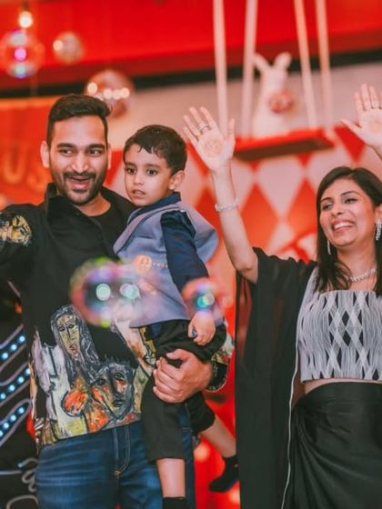 The whole family joins in the celebration on the circus stage. These are the moments that matter most, and I design my events to bring families together in a joyful, magical setting.