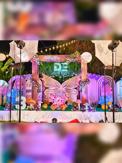 I specialize in creating immersive worlds for children's birthdays. This 'Enchanted Garden' butterfly theme features a grand stage with custom props, professional lighting, and intricate balloon arrangements to make any child's dream party a reality.