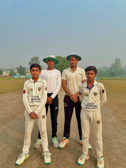The captains with the umpires, ready for the game.