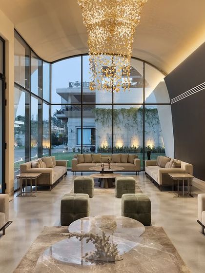 This outhouse is designed to be a versatile space that feels welcoming day and night. Sunlight floods the room during the day, and as evening falls, warm, ambient lighting transforms it into a cozy retreat, perfect for entertaining or quiet reflection.