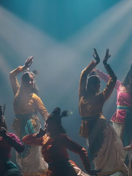 A vibrant moment from a group Kathak choreography. The interplay of colors, movement, and light creates a visual spectacle, showcasing the collective energy of our talented students.