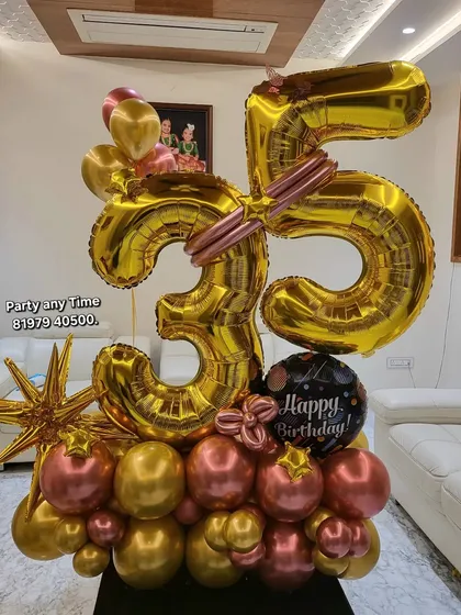 A 35th birthday number bouquet in gold and rose gold.
