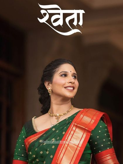 A beautiful portrait of Shweta. Her makeup is natural and subtle, perfectly complementing her traditional attire.