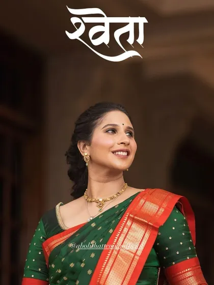A beautiful portrait of Shweta. Her makeup is natural and subtle, perfectly complementing her traditional attire.