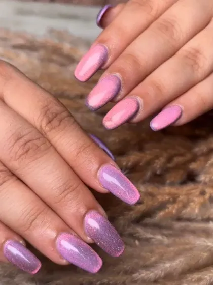 A vibrant pink and purple glitter ombre set. This look is fun, sparkly, and perfect for anyone who loves a bold and colorful manicure.