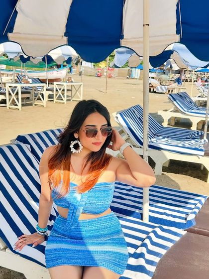 Another look at my beach day outfit. The vibrant blue is perfect for a sunny day by the sea.