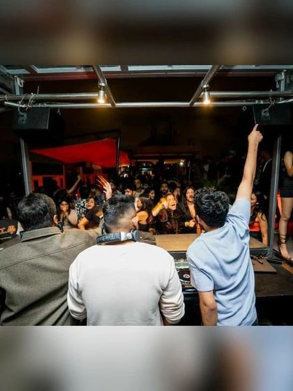 A view from behind the console, looking out at a packed house at Kitty Ko. This is my office, and I love it.