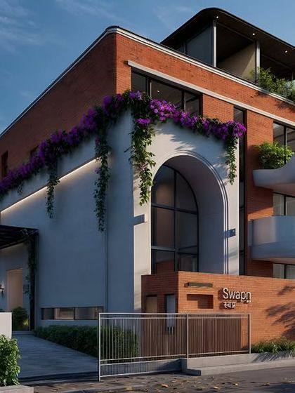 This 12,000 sq. ft. bungalow in Pune features exposed brick cladding to blend with its natural surroundings. The earthy tones and textures create a warm, inviting exterior, paying homage to traditional materials within a modern design context.