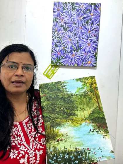 Holding my landscape painting, which was created live at Cubbon Park.