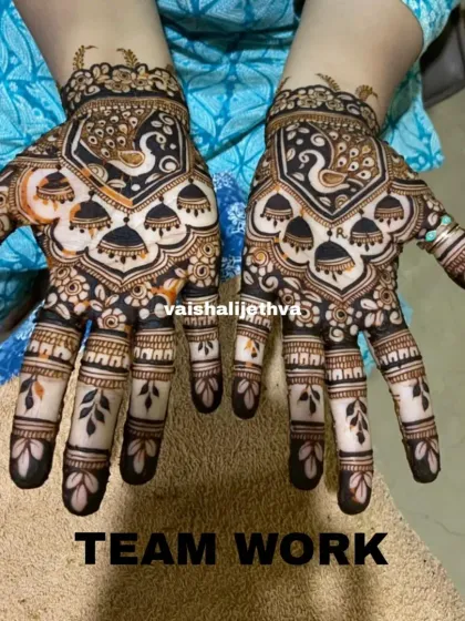 My team's skill shines in this design with peacock and jhumka motifs. It's a popular and festive choice for wedding siders.