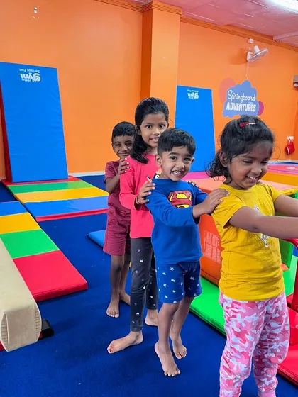 All smiles in the conga line. This simple game is a great way for kids to practice following directions and moving as a group, all while having a great time with their friends.