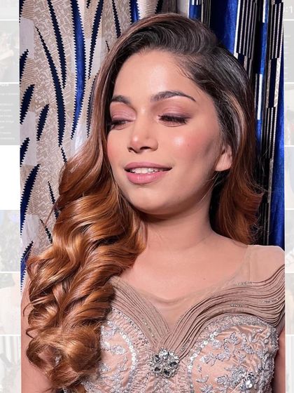 Ringlet curls are so romantic and pretty. We created this side-parted style with defined curls for a soft and feminine party look.