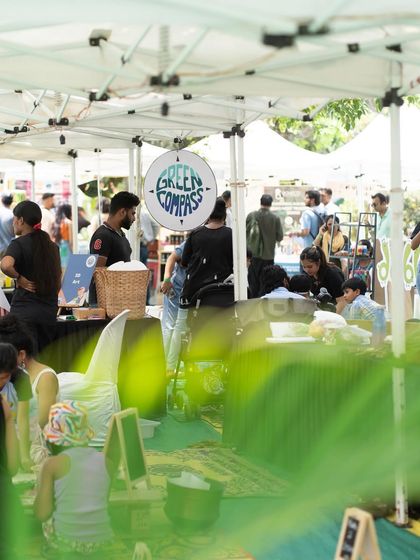 A glimpse of the Green Compass stall, one of our regular partners, busy with families exploring their sensory play offerings. I prioritize vendors who offer engaging and educational products.