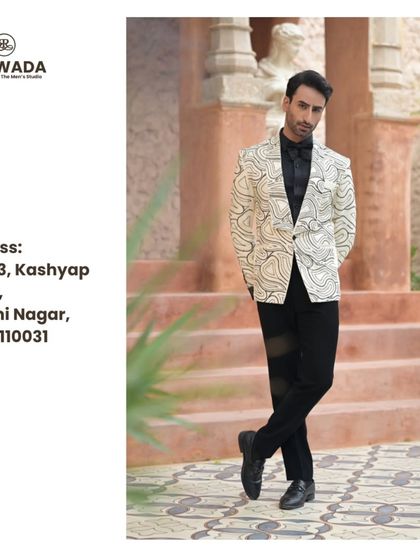 A full-length view of the abstract line-work tuxedo, showcasing its modern fit and artistic design.